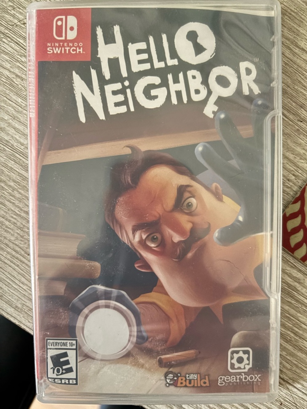 Nintendo Hello Neighbor Game Case with Red and Black Artwork